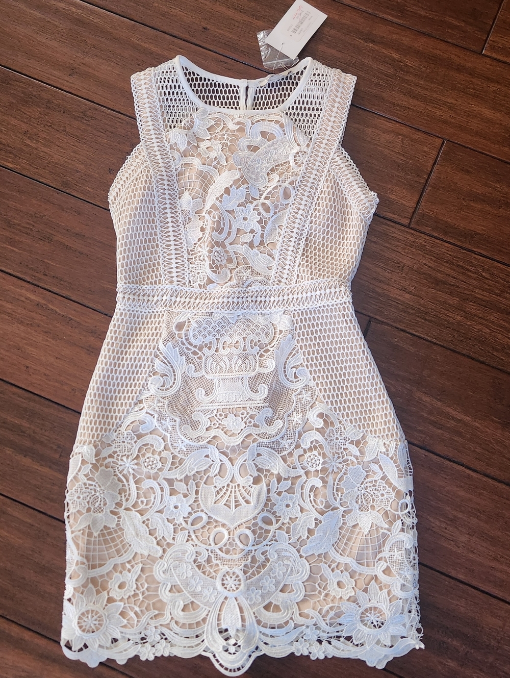 the clothing company White Lace Crochet Mini Dress